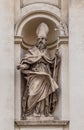 Saint Claude by Guglielmo-Antonio Grandjacquet on the facade of Santi Claudio e Andrea dei Borgognoni church in Rome, Italy