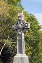 Saint Columba memorial celtic cross and trees Royalty Free Stock Photo