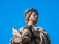 Saint Cosmas Statue on Charles Bridge, Prague, Czech Republic Royalty Free Stock Photo