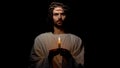 Saint in crown of thorns holding candle and looking to camera christian religion Royalty Free Stock Photo