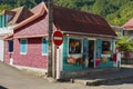 Colorful souvenir and fruit shop building at the town of Fond de Rond Point in Saint-Denis De La Reunion, France.