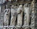 Saint Denis Statue Holding His Head at Notre Dame Cathedral