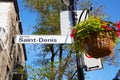 Saint Denis street sign attached to lamp post in Montreal Quebec