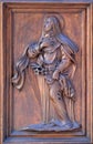 Saint, detail of te door of Church Santa Maria Maggiore in Florence