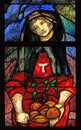 Saint Elizabeth of Hungary, detail of stained glass window in Franciscan abbey in Kleinostheim, Germany