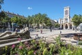 The square of Jean Jaures in Saint Etienne downtown with fountains. Morini Andre catholic church is at right background Royalty Free Stock Photo