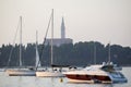 Saint Euphemia bell tower and anchored sailboats Royalty Free Stock Photo