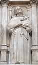Saint Francis of Assisi, statue on the facade of Saint Augustine church in Paris Royalty Free Stock Photo