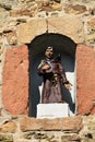 Saint Francis statue in the city gate Werther Tor in Bad Muenstereifel. Royalty Free Stock Photo