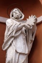 Saint Francis statue on the portal of St. Barnabas Church in Modena, Italy