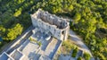 Aerial view of the Saint-FÃÂ©lix de Montceau Abbey, and its gardens in the middle of the woods surrounding it. In the Herault.