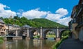 Bridge over the Lot in Saint-Geniez-d\'Olt in the department of Aveyron (France) Royalty Free Stock Photo