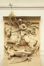 Saint George killing Dragon. Stucco decoration on Art Nouveau bu Royalty Free Stock Photo