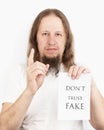 Jesus Christ holding anti-fake message Royalty Free Stock Photo