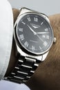 Saint-Imier, Switzerland 31.03.2020 - Closeup fashion image of Longines watch on wrist of man Longines man watch