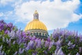 Saint Isaac`s Cathedral in the flowers of lilac and Apple trees Royalty Free Stock Photo