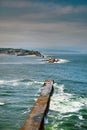 Saint Jean de Luz, France. Basque country. City views Ciboure and Castle and port of Socoa. Ocean waves breaking about the dam