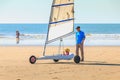 Trainer gives a lesson of sand yachting