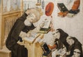 Saint Jerome translating the Gospels, 1450. Painted by Nicolas Frances Royalty Free Stock Photo