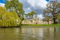 Saint John College on a bright sunny day with patches of clouds over the blue sky, Cambridge, United Kingdom