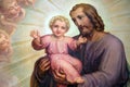 Saint Joseph holding baby Jesus, altarpiece in the Basilica of the Sacred Heart of Jesus in Zagreb Royalty Free Stock Photo