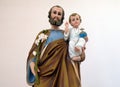 Saint Joseph holding baby Jesus