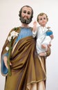 Saint Joseph holding baby Jesus Royalty Free Stock Photo