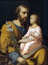 Saint Joseph holding child Jesus Royalty Free Stock Photo