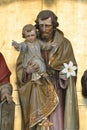 Saint Joseph holds the baby Jesus, a statue on the high altar in the church of Saint Joseph in Slatina, Croatia
