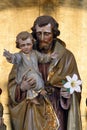 Saint Joseph holds the baby Jesus, a statue on the high altar in the church of Saint Joseph in Slatina, Croatia
