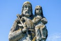 Saint Joseph with little Jesus Christ. Ancient statue Royalty Free Stock Photo