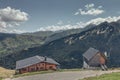 Typical mountain log cabins on the height of the mountains Royalty Free Stock Photo