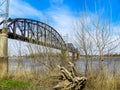 Saint Louis, MO USA - Mississippi River Bank with Industrial Bridge Royalty Free Stock Photo