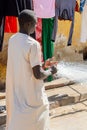 Unidentified Senegalese man holds a fishing net at the local ma Royalty Free Stock Photo