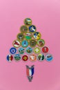 Pyramid of merit badges and Eagle pin on pink