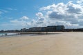 Tourists enjoy a beautiful day on the beaches at Saint-Malo in Normandy during the long summer holdiays