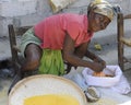 SAINT MARC, HAITI - FEBRUARY 22, 2013. A Haitian vendor looking