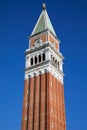 Saint Mark bell tower detail in Venice in a sunny summer day, Italy