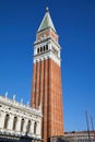 Saint Mark bell tower and National Marciana library facade in Venice, Italy