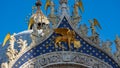 Saint Mark`s Basilica in Venice, ITALY. Architectural details of Saint Mark`s Basilica, Venice, Italy. Saint Mark`s golden lion Royalty Free Stock Photo