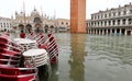 Saint Mark square during the high tide in Venice in Italy and re Royalty Free Stock Photo