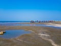 Saint martin beach - Bangladesh`s largest island beach with beach umbrellas and a blue sky Royalty Free Stock Photo