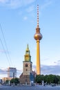 Saint Mary`s church St. Marienkirche and TV tower on Alexanderplatz square, Berlin, Germany