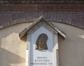 Saint Mary war memorial with latin inscription. in Collegno