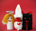 Saint Nicholas, Angel and Devil made by a child from toilet paper roll tubes Royalty Free Stock Photo