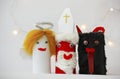 Saint Nicholas, Angel and Devil made by a child from toilet paper roll tubes Royalty Free Stock Photo
