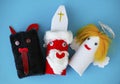 Saint Nicholas, Angel and Devil made by a child from toilet paper roll tubes Royalty Free Stock Photo