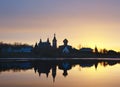 Saint Nicholas Monastery for Men in Staraya Ladoga, view from a bank of Volkhov river at sunset.