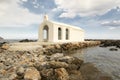 Saint Nicholas small church abandoned in the sea on the stones and rocks