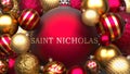 Saint nicholas and Xmas, pictured as red and golden, luxury Christmas ornament balls with word Saint nicholas to show the relation Royalty Free Stock Photo